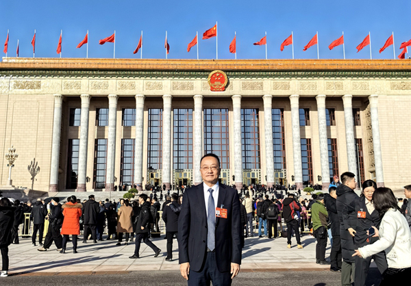 人大代表庹慶明：潤育桃李三十載　為民代言踐初心